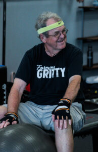 Rock Steady Boxing member smiling at Grit Box